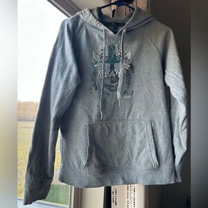 VANS- size small grey hoodie featuring native skull print